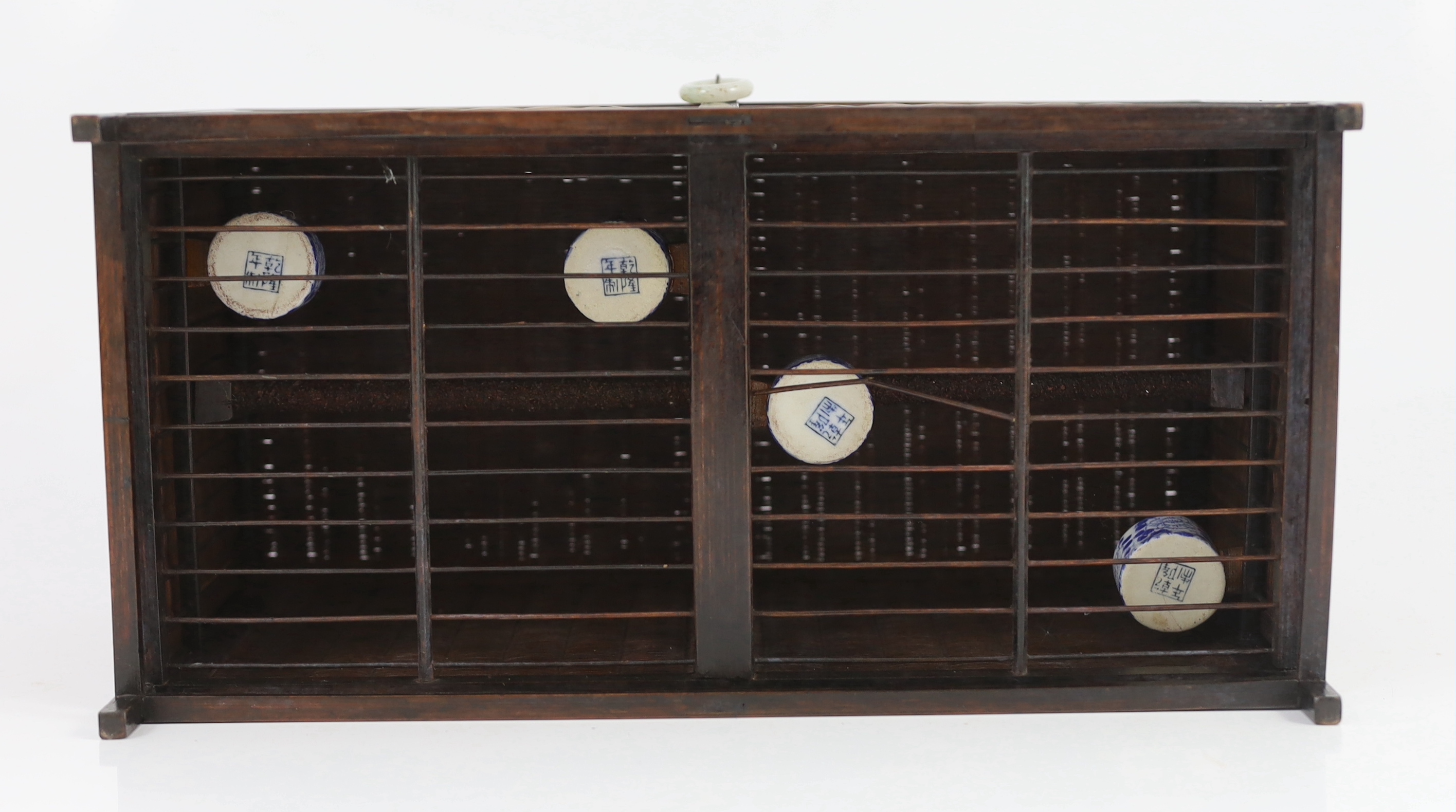 A Chinese wood and bamboo bird cage, late 19th century